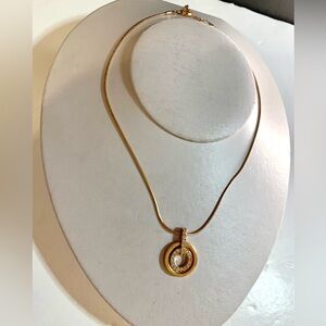Swarovski Rose Gold tone circle pendant and necklace